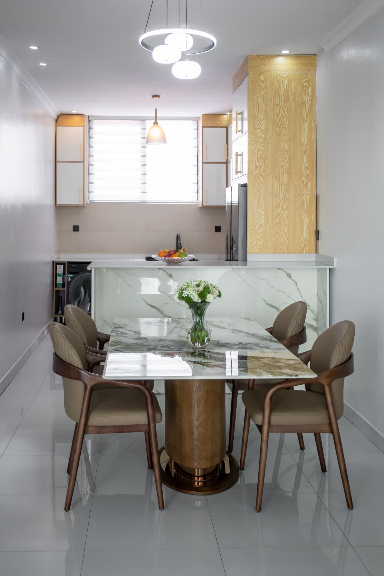 Marble dining table beside the breakfast bar