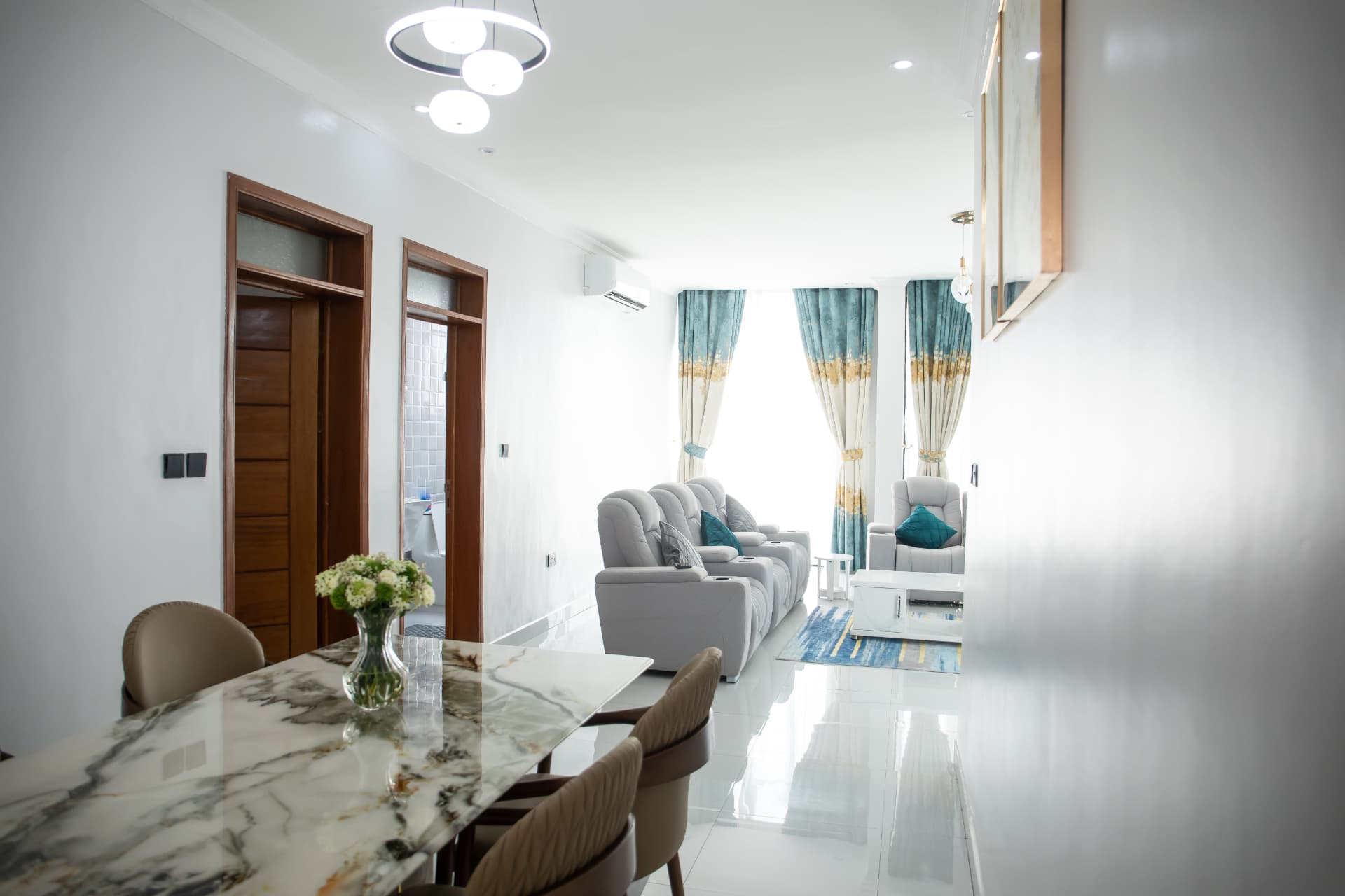 Open-plan dining and living view towards the balcony